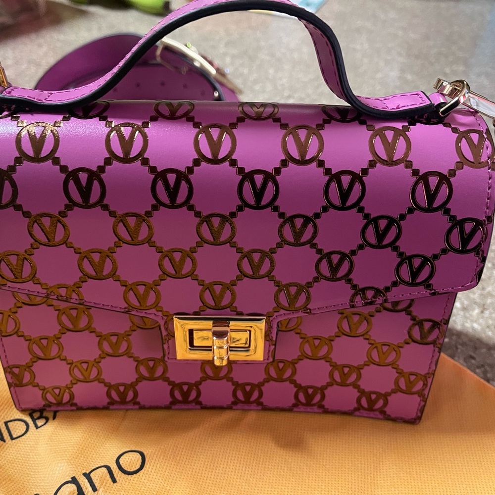 Valentino designer handbag, never used. Purchased from Saks